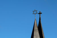 Side by side spires with cross and star of david